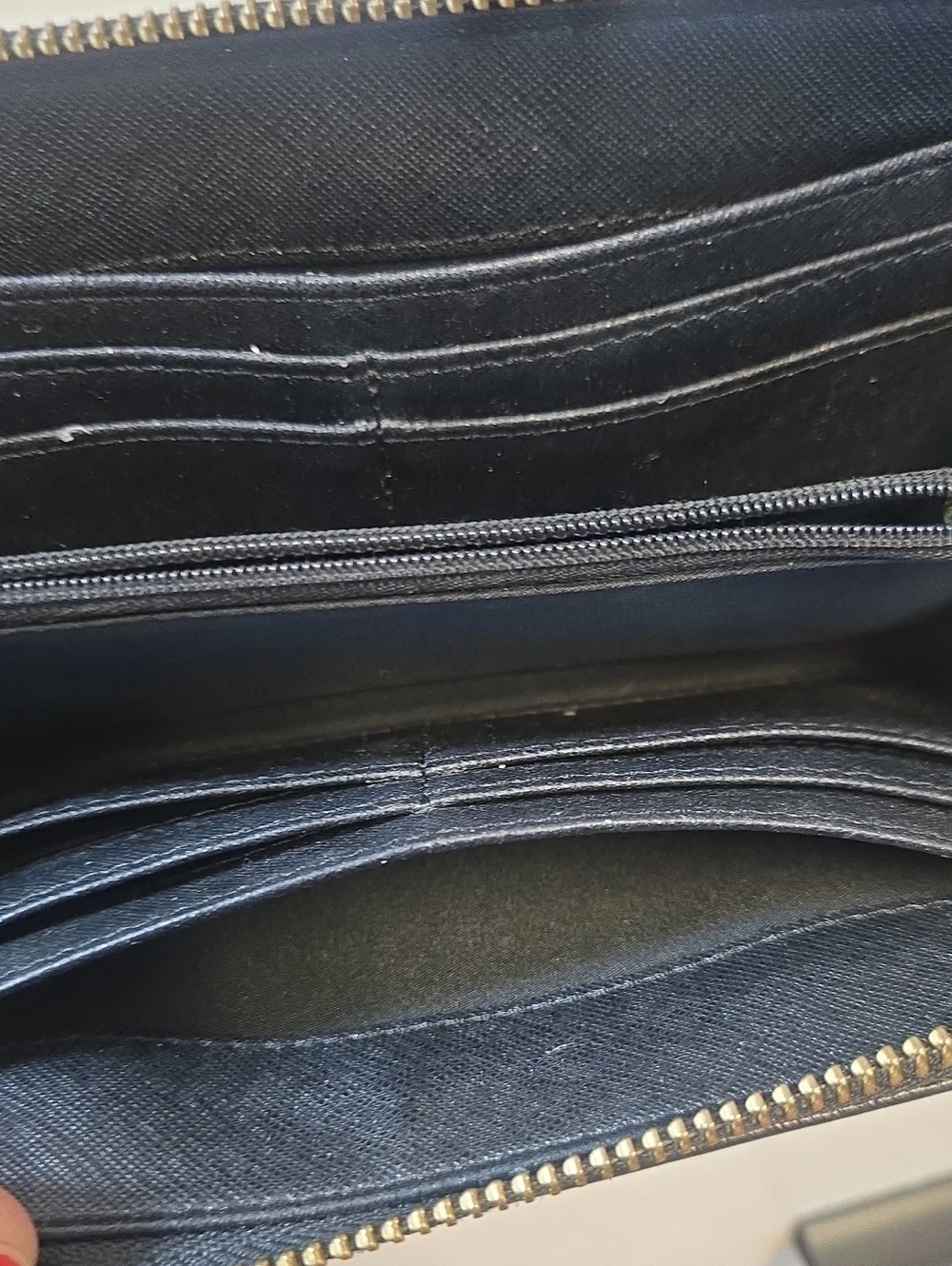 Fossil Black Leather Zip-Around Wallet with Gold Logo